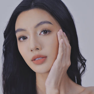 Model showcasing EyeCandys Sunlit Hazel colored prescription lens in a detailed eye close-up video.