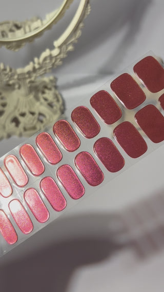 Applying EyeCandys Apple Pie Gel Nail Stickers – velvety red nails with iridescent golden chrome finish for Halloween. DIY salon-quality gel manicure with festive, multi-dimensional shine. Non-toxic, vegan, and long-lasting nail stickers perfect for holiday-themed nail art.