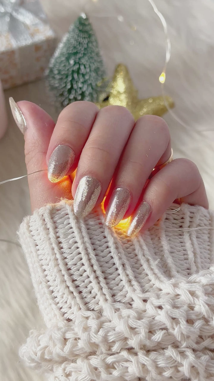 a video showcasing Eyecandys semi cured gel nail stickers in "All that glitters" with festive vibe. 