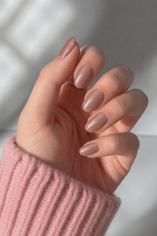 Mauve Over press-on nails worn on hand