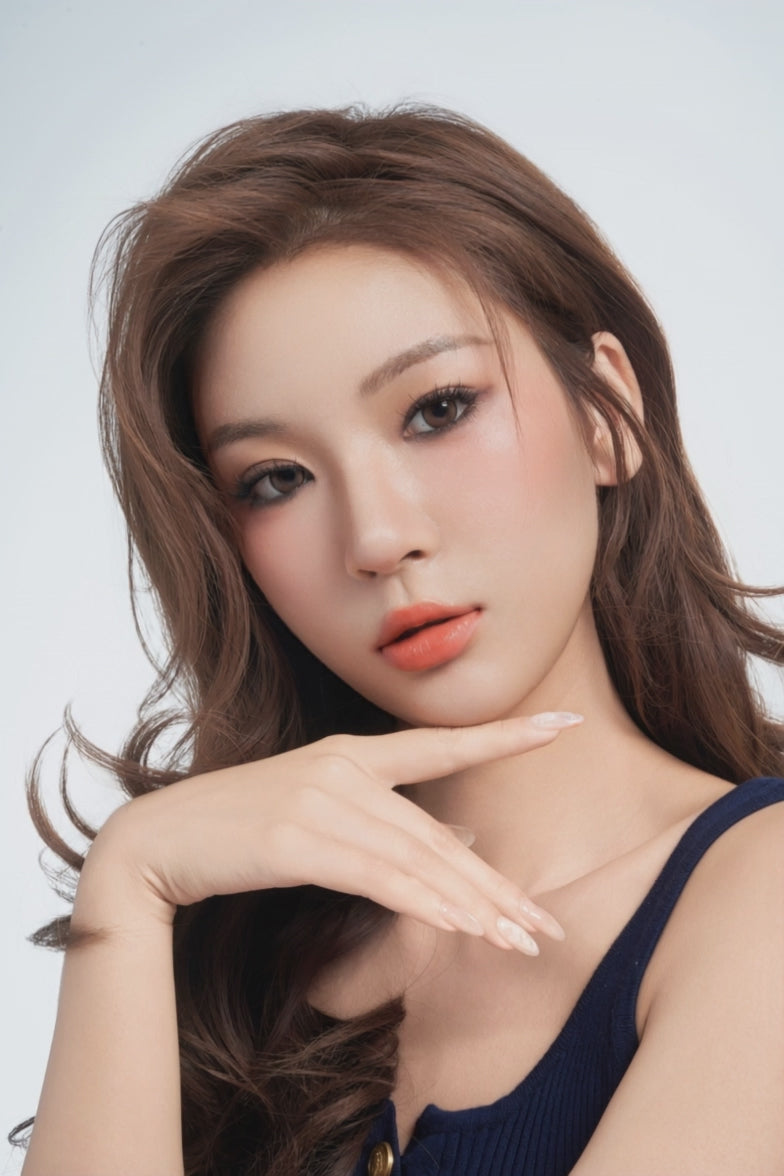 EyeCandys Glossy 03 lashes on a model, featuring a polished false lash look for soft glam and statement eye makeup.