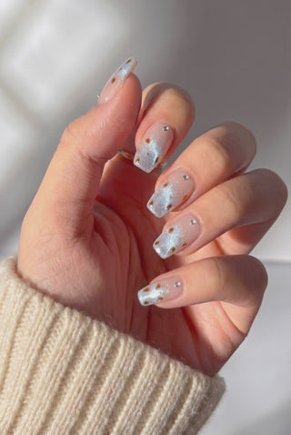 EyeCandys Snow Patrol press-on nails featuring a cool-toned stylish manicure on a hand