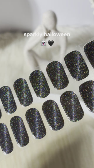 Meow Me Back gel nail stickers by Eyecandys – easy DIY manicure with cute cat-inspired nail art, long-lasting salon look at home. Halloween black holographic glitter gel nail stickers