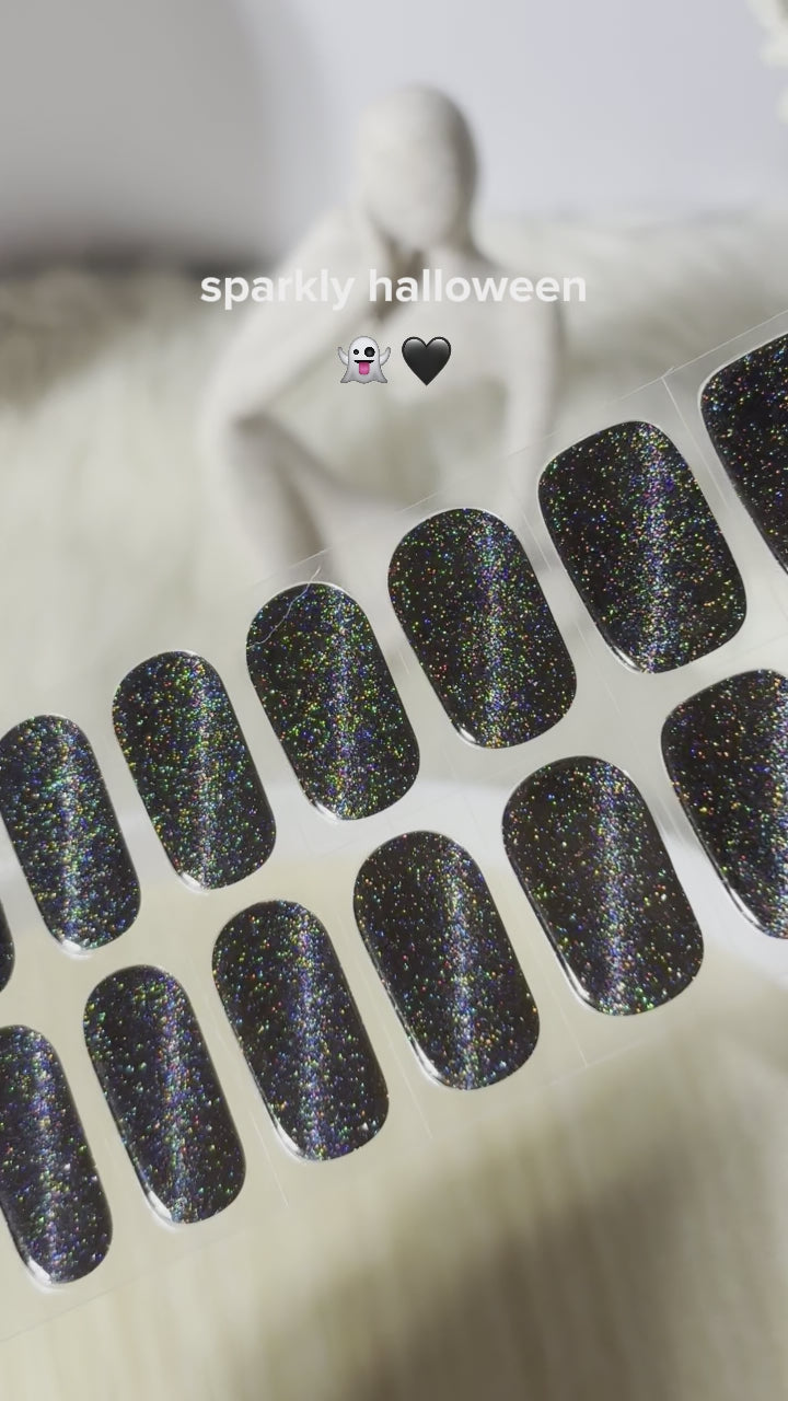 Meow Me Back gel nail stickers by Eyecandys – easy DIY manicure with cute cat-inspired nail art, long-lasting salon look at home. Halloween black holographic glitter gel nail stickers