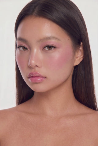 EyeCandys Fluffy 02 false lashes on a model, featuring a fluffy lash style for enhanced eye definition and everyday glam.
