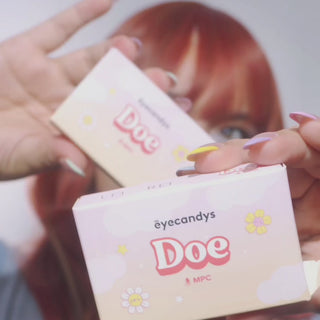 Video of model wearing EyeCandys Doe Blue colored contact lenses. Full face and close-up of eyes showing ocean-inspired blue iris, long lashes, soft limbal ring, and natural enhancement for a striking yet refined look.