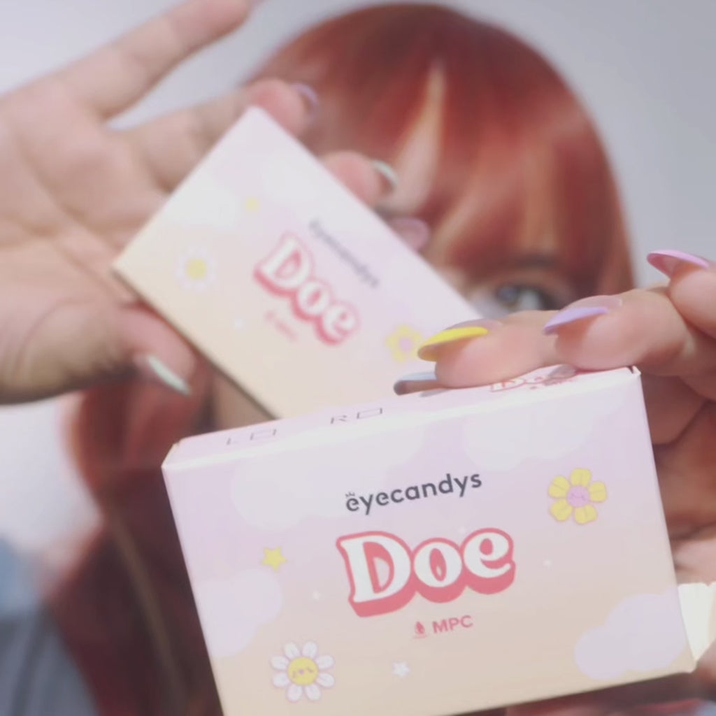 Video of model wearing EyeCandys Doe Blue colored contact lenses. Full face and close-up of eyes showing ocean-inspired blue iris, long lashes, soft limbal ring, and natural enhancement for a striking yet refined look.