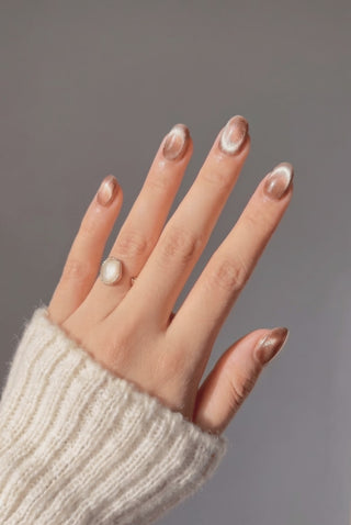 Mocha Mirror press-on nails worn on hand