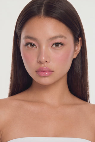 EyeCandys Wispy 01 lashes on a model, showcasing defined, feathered false eyelashes for a pretty, fluttery finish.