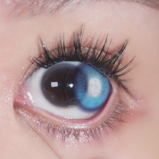 Natural dark brown eye wearing EyeCandys Bunnie Jelly Blue contact lens. Perfect for colored contact lenses, prescription colored contact lenses, and Halloween contact lenses.