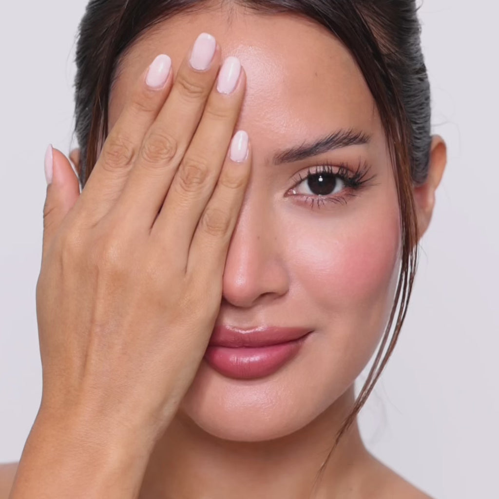 Model wearing EyeCandys Cashmere Hazel colored contact lenses with long lashes, showcasing a warm hazel eye transformation, realistic iris texture, subtle enlargement, and a natural everyday style.