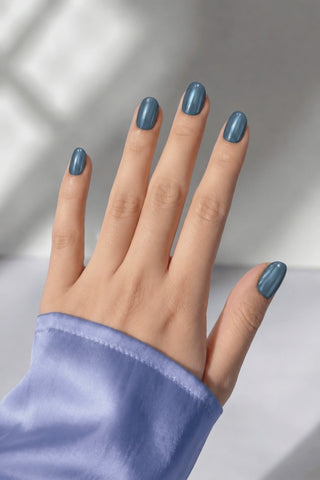 Peacock press-on nails worn on hand