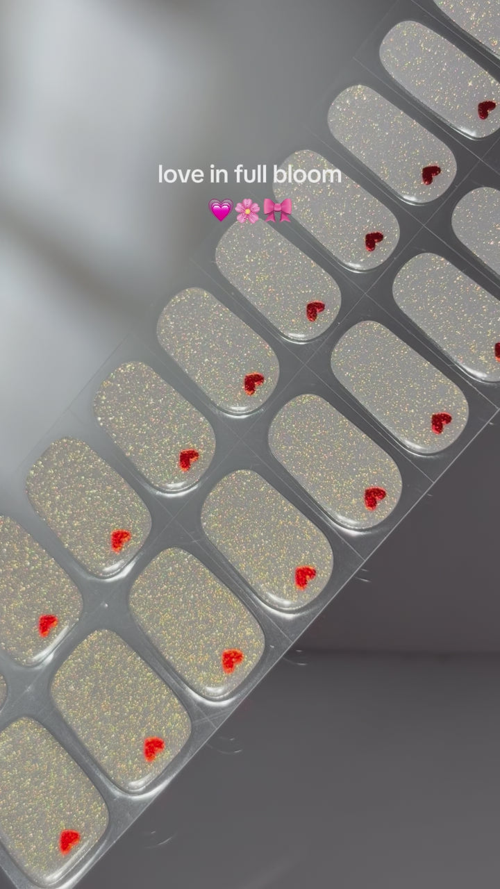 Application of EyeCandys "Don't Play With My Heart" Gel Nail Sticker with glitter and heart design, perfect for DIY sparkling manicure and nail art.