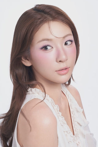 EyeCandys Glamorous 01 false lashes on a model, featuring a defined lash style for elevated everyday makeup and special occasions.