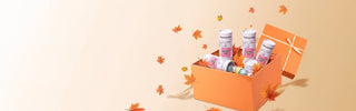EyeCandys sampler set gift box filled with lens samplers and autumn leaves against a warm peach background.