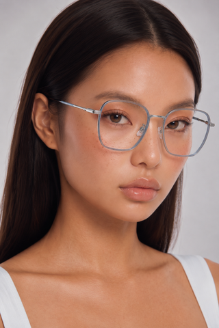 EyeCandys Therese Oversized Square clear lens glasses model shot featuring oversized square frames with non-prescription clear lenses, trendy women's fashion eyewear, blue light style glasses for everyday wear, office outfits, minimalist fashion, and modern chic looks.