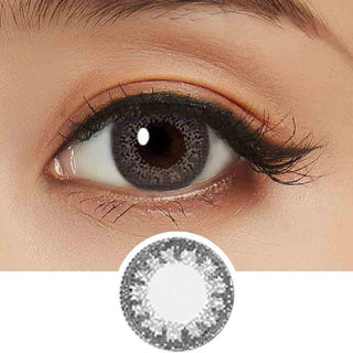 Collage showing Close-up shot of a model eye wearing Lacelle Colors Frozen Grey colored contact lens in one eye that is naturally dark-brown with natural eye make up and lashes, Single Lacelle Colors Frozen Grey contact lens on a white surface showing the pixel detail