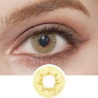 Close-up of Pink Label Dewy Hazel colored contact lens on dark eyes