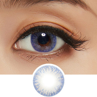 Detailed view of a Pink Label Moonlight Blue contact lens on a dark brown eye, showing the eye-enlarging effect of the circle lens, above a detailed design of the lens itself.