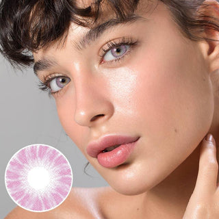 Portrait of a woman wearing Shade Pink color contact lenses on light eyes