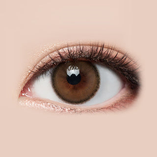 Close-up of LensMe Holoris Ginger Brown contact lens (a circle lens) on a hazel eye