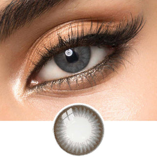 Close-up of Melbourne Grey circle lenses on a model's eye, showing the realistic subtle enlarging effect.