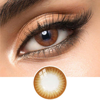 Close-up of Melbourne Brown circle lenses on a model's eye, showing the realistic subtle enlarging effect.