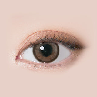 Design of the i-Sha Molton 1-Day Ash Brown (10pk) coloured contact lens from Eyecandys on a white background, showing the pixel dotted detail and limbal ring.