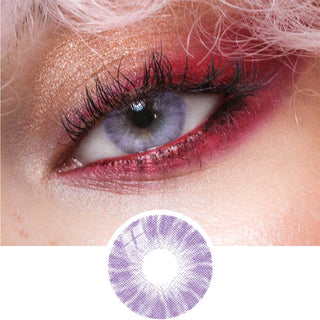 Close-up view of natural looking violet purple contact lens on a medium brown eye, paired with bold red eye makeup, next to a cutout of the contact lens