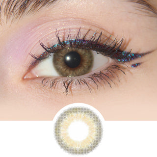 Natural Brown contact lenses worn on a model's dark eye from EyeCandys Sugarlook series and the graphic design of the colour contact lens
