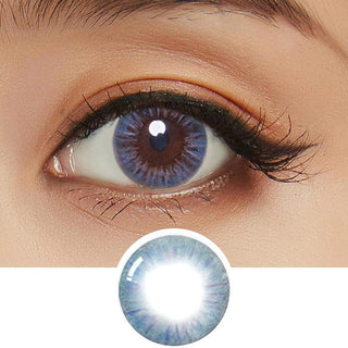 Close-up of model's eye showcasing Birthday Blue contact lens, enhanced by peach eyeshadow, with a cut-out of the lens below.