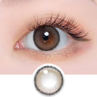 Close-up view of Canna Roze Daily 1-Day Nude Brown (10pk) Natural Color Contact Lens dailies for Dark Eyes, above a cutout of the lens design showing the pixel detail.
