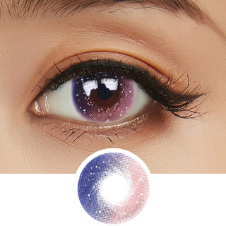 Close-up of a woman's eye wearing the Pink Label Galaxy Pink contact lens with peach eyeshadow