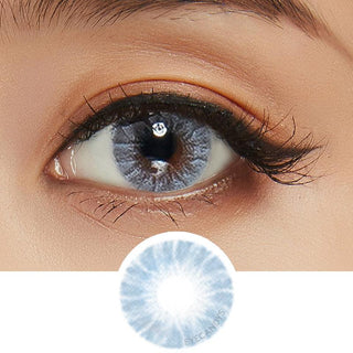 Close-up shot of a model wearing Shade Blue prescription colored contact lens in one eye that is naturally dark-brown